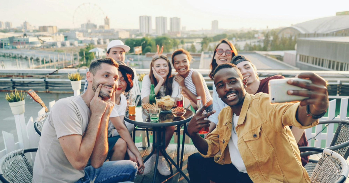 a group selfie to show how to make friends in abu dhabi