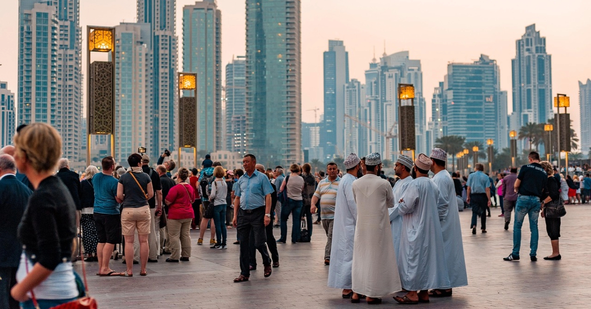 people walking in dubai