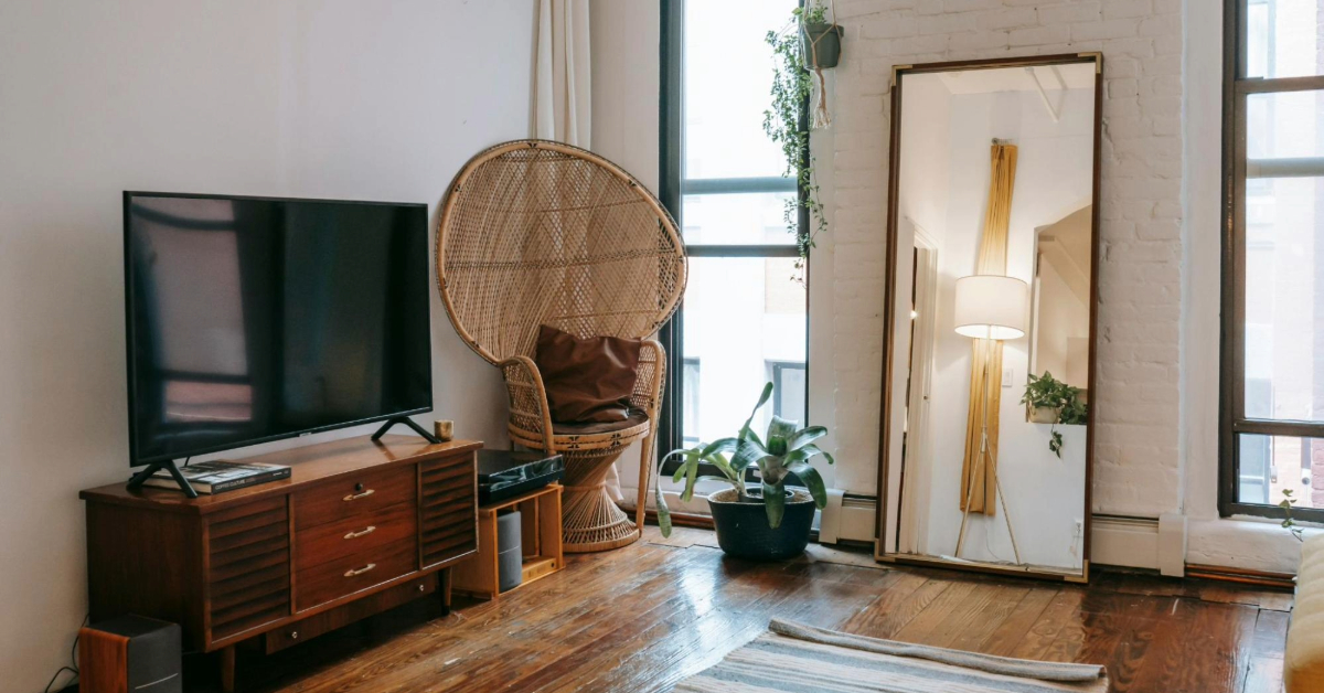 Modern living room showing a wall mirror in natural light