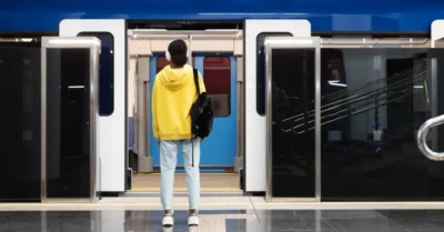 A man waiting for his metro ride