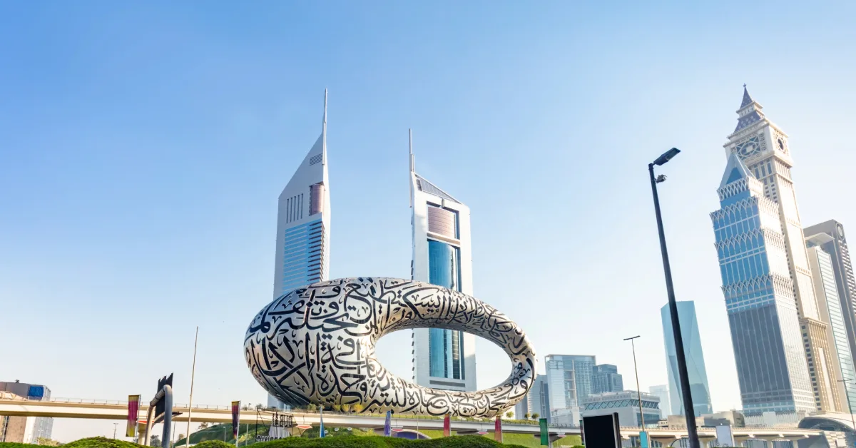 Museum of the Future Dubai with Emirates Towers in the background on Sheikh Zayed Road