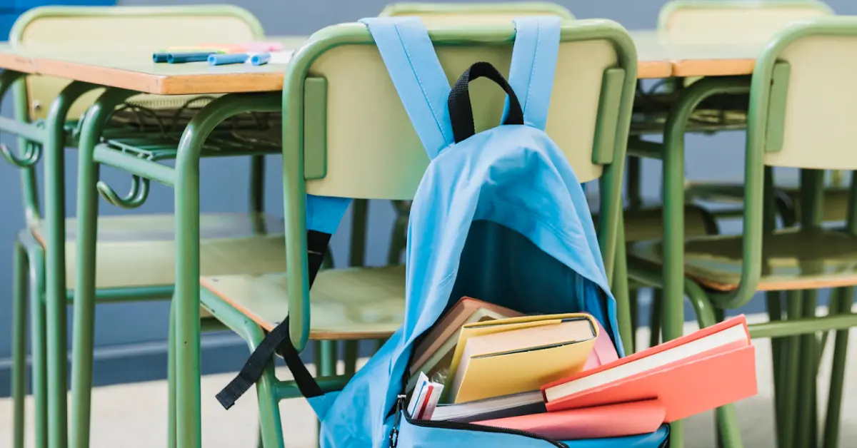 Chair with backpack in school