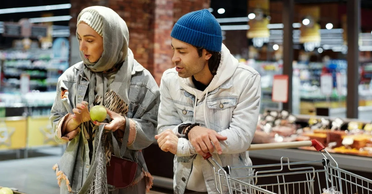 Couple buying groceries in LuLu Village