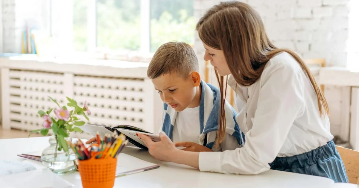 Nanny supporting a child in learning