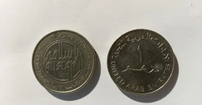 Close-up image of Emirati dirham coins