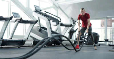 Man Wearing Red Shirt Exercising
