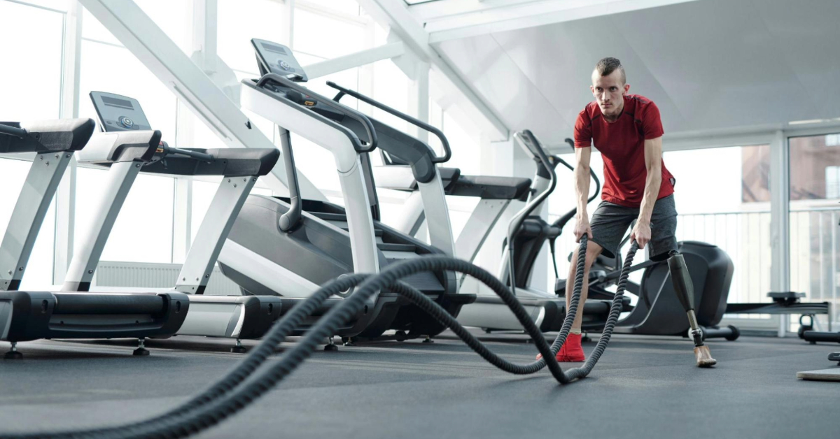Man Wearing Red Shirt Exercising