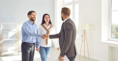 Man selling a house as an example of how to flip a house in the UAE