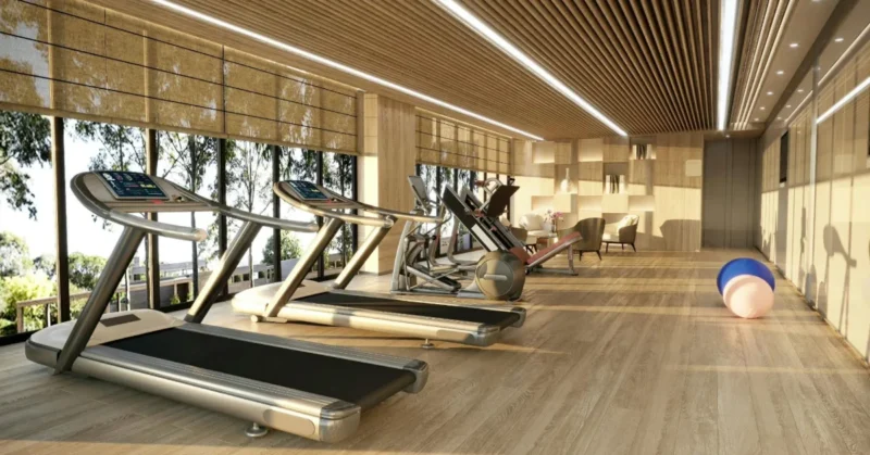 Modern gym with treadmills and large windows