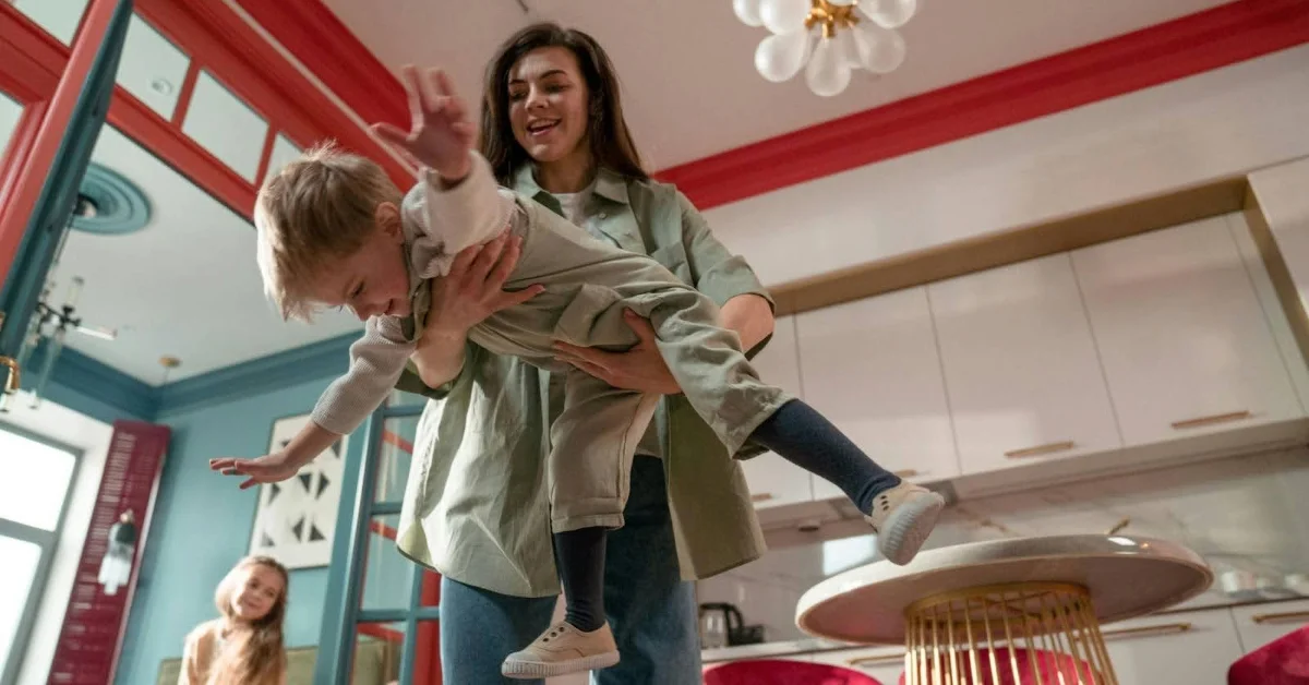 Nanny being playful with kids