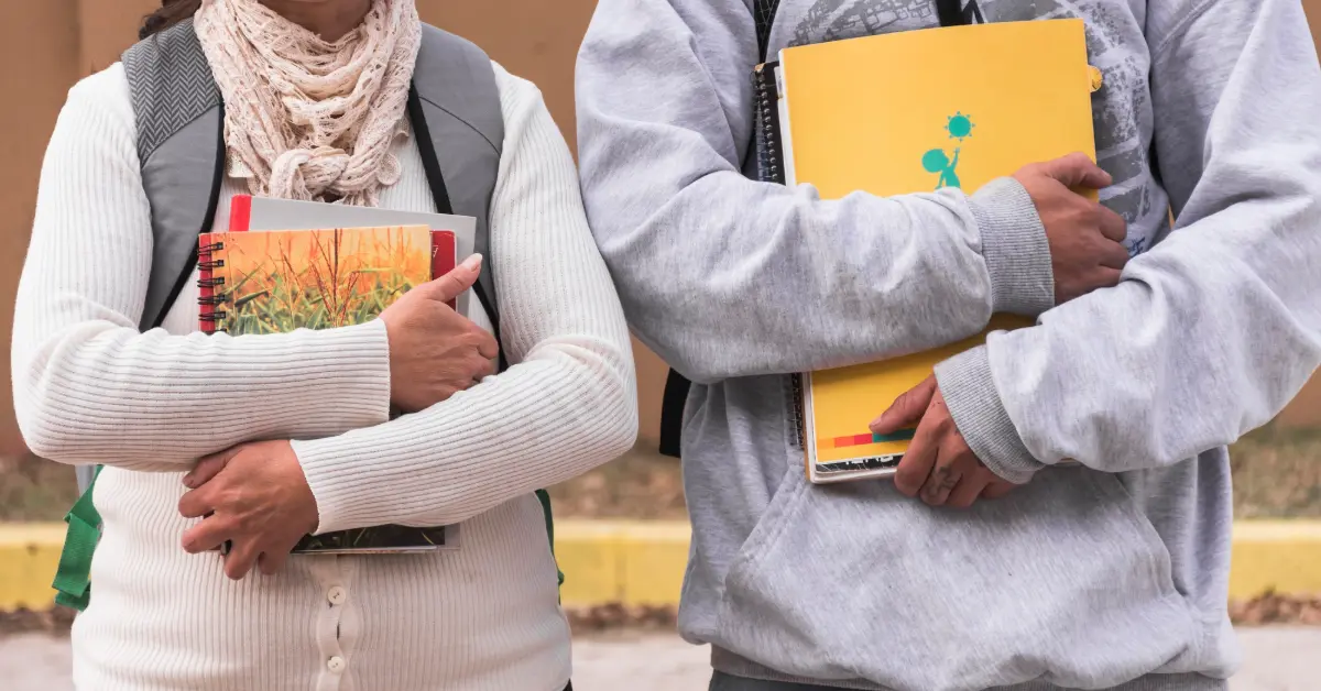 Students with notebooks