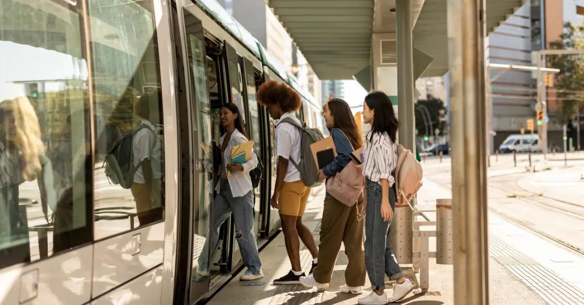 Passengers on a public bus in Dubai going to the Outlet Village