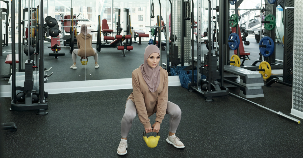 Woman training in a mixed gym