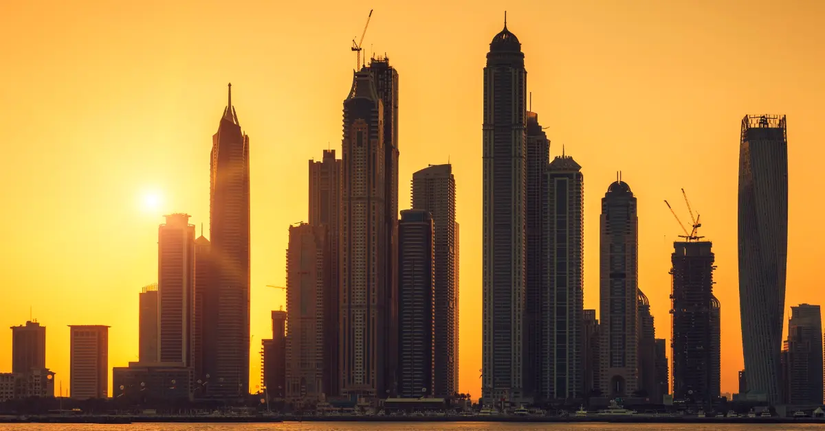 View of dubai with sun at sunrise