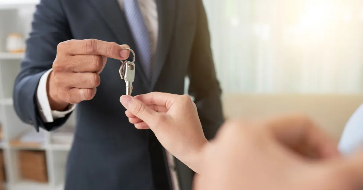 Landlord giving house keys