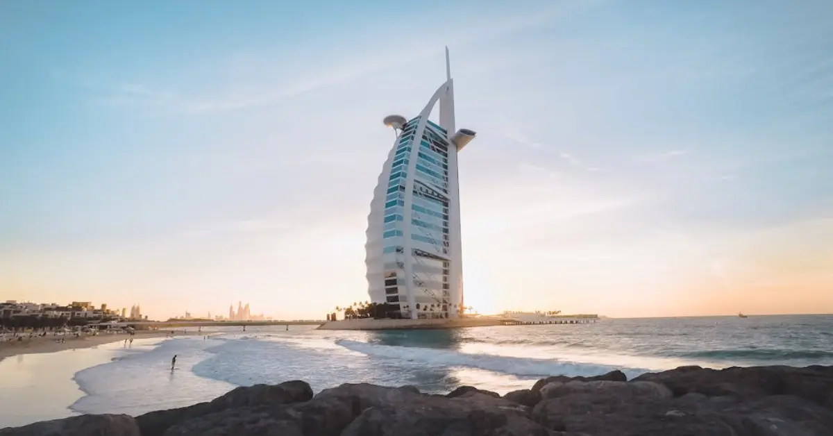 View of Jumeirah Beach from a low angle, highlighting the iconic Burj Al Arab in the background