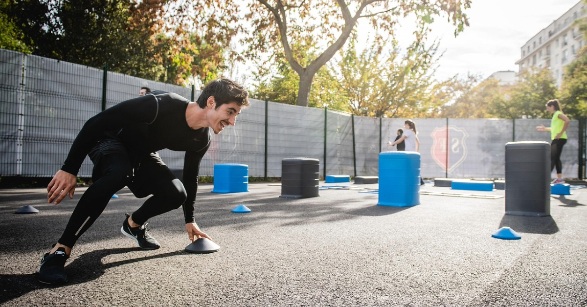 man wearing black exercising