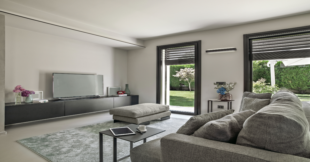 Modern living room interior showing difference between condo vs apartment