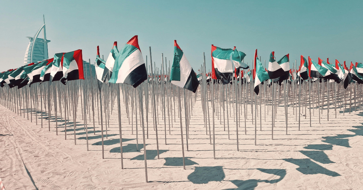 UAE National Flags on Dubai Beach with Burj Al Arab
