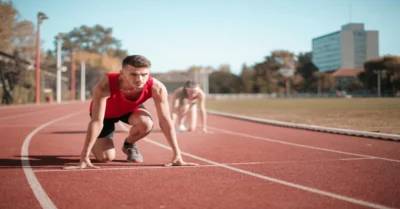 A man getting ready to start running