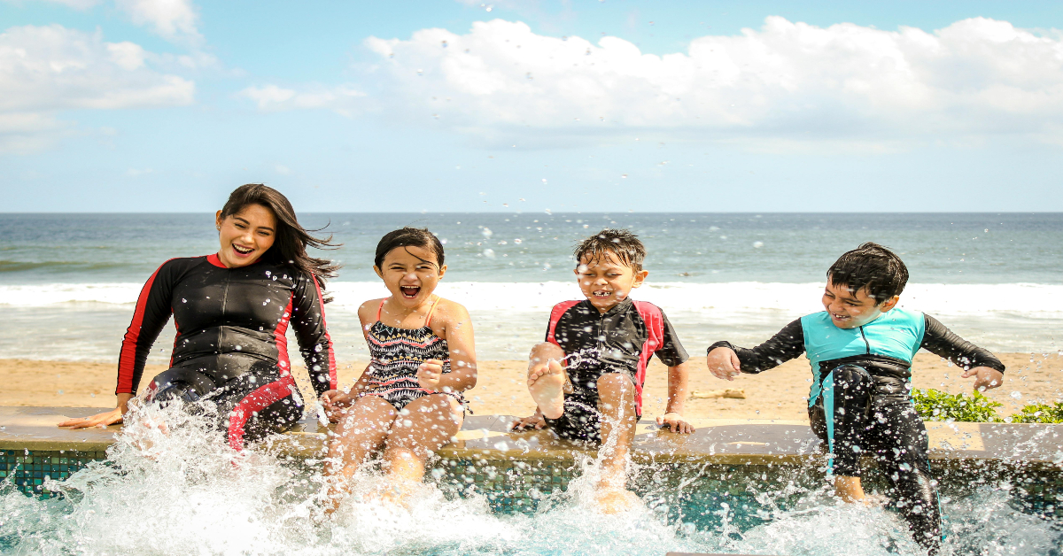 Family playing at beach