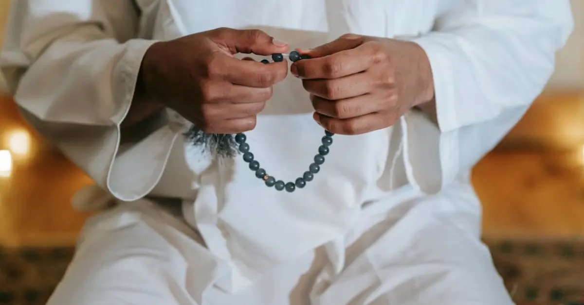 a person praying and performing sujood