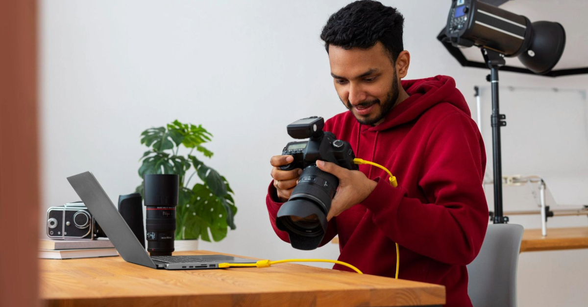 A man setting up his camera for an online photography class