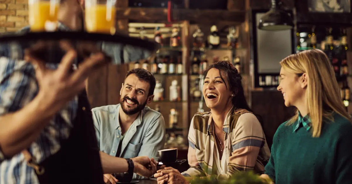 Friends enjoying their time at a classic British gastropub