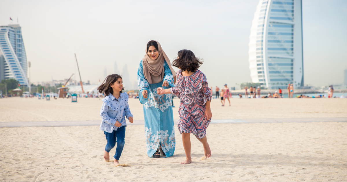 Family on the beach in Dubai