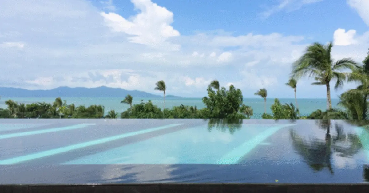Luxury infinity pool at Dubai with ocean backdrop
