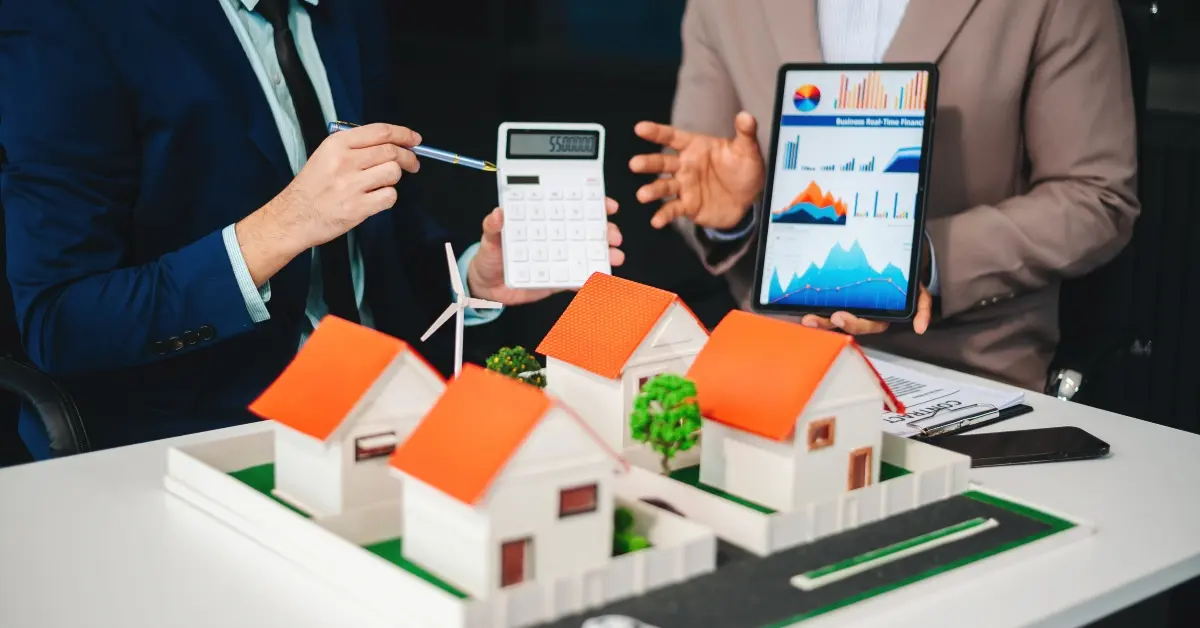 Real estate broker agent presenting to an investor