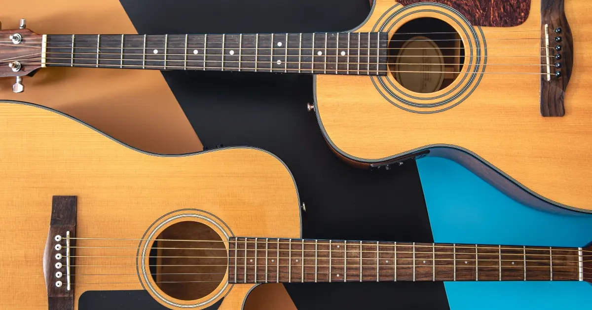 Two guitars placed on a table