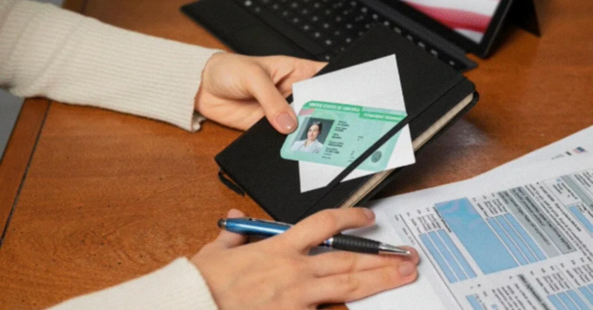 A person identifying changes in an official ID