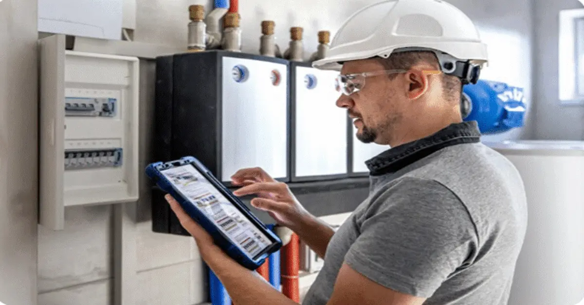 Technician checking a gas meter