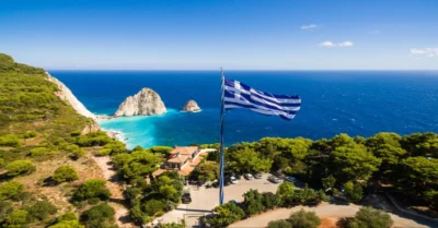 Greek Flag waving in the middle of an island
