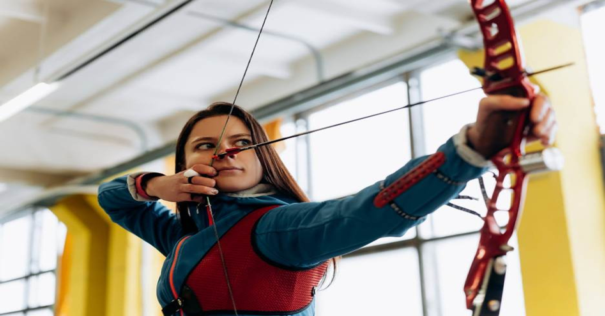 A woman practising archery in Dubai
