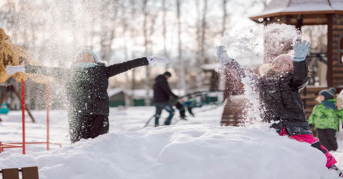 Children playing in snow area in Yas winter festival