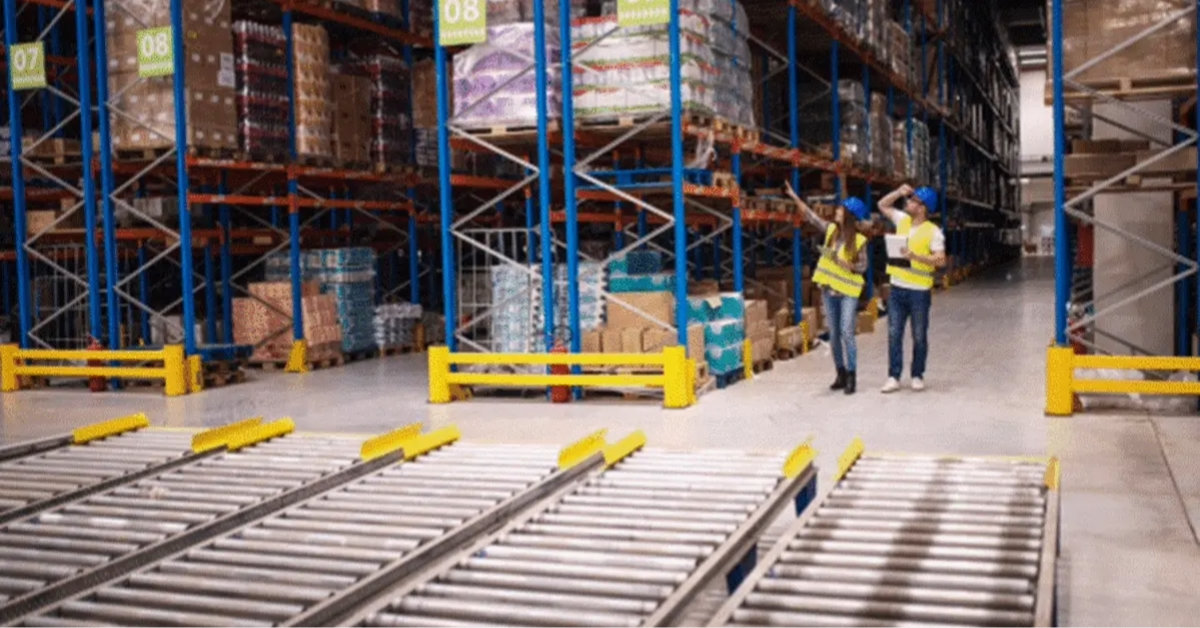 Two workers managing Yiwa Market&rsquo;s logistics facility