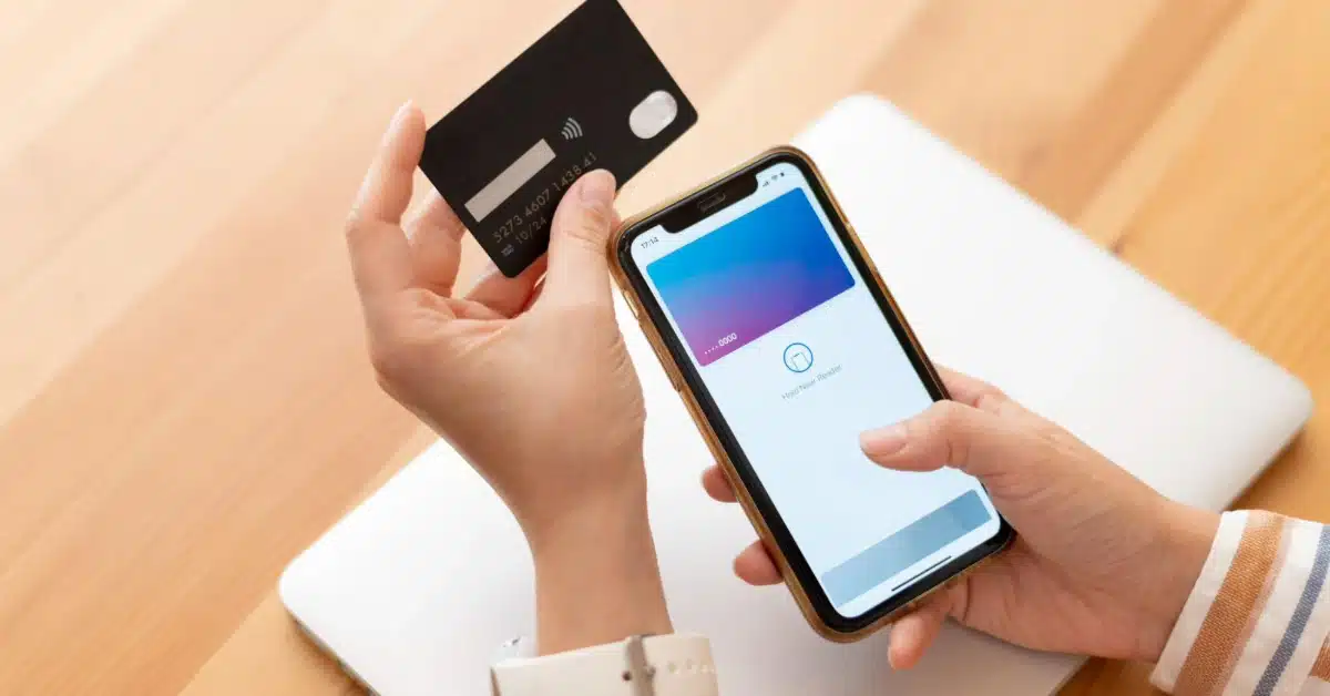 A woman making an online payment using her card