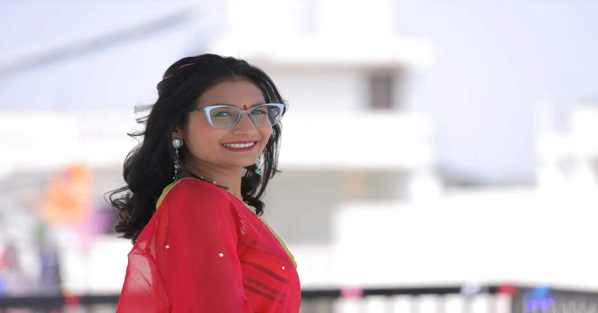 beautiful Indian lady in a traditional red dress