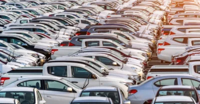 Rows of cars for sale at Souq Al Haraj auto market in Sharjah