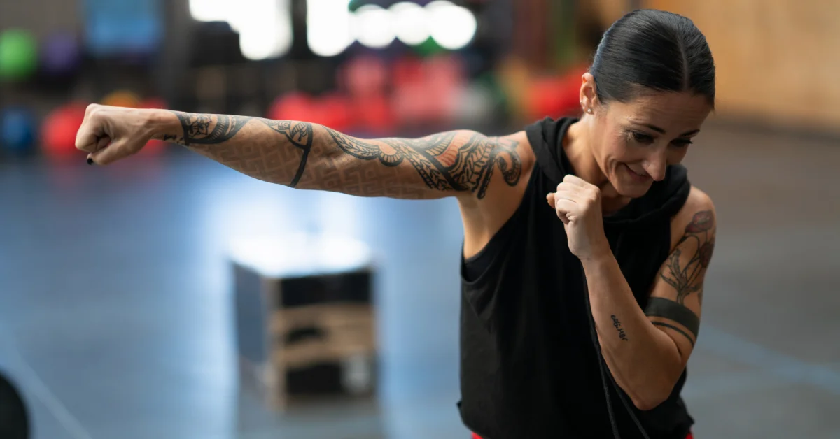instructor doing shadowboxing in a gym in Abu Dhabi