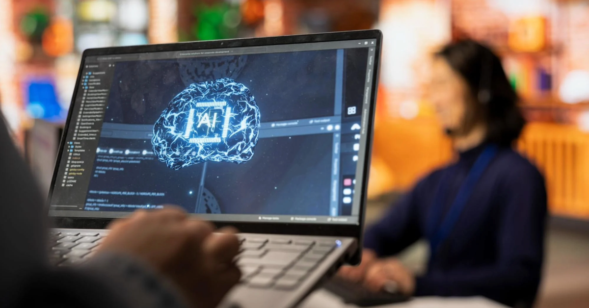 A man using a laptop with AI technology.