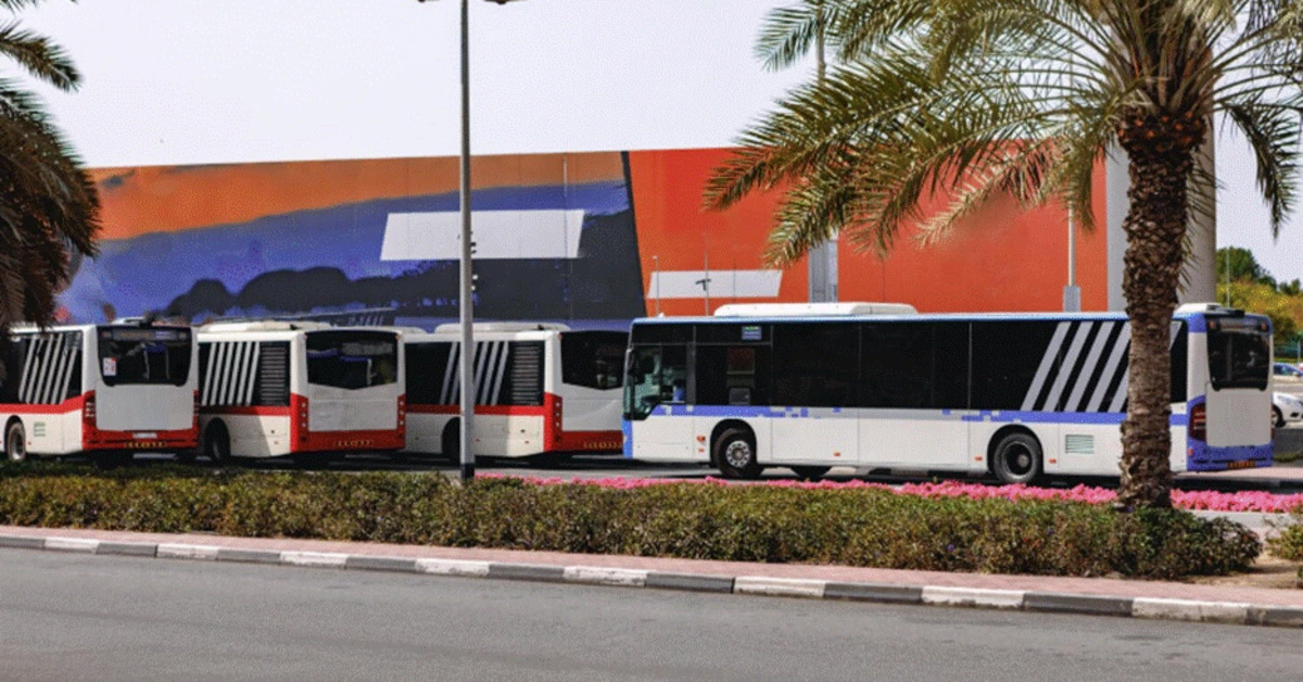 Al Rashidiya bus station with metro station in the background
