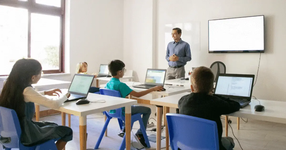 Children studying inside a classroom of a Dubai international school