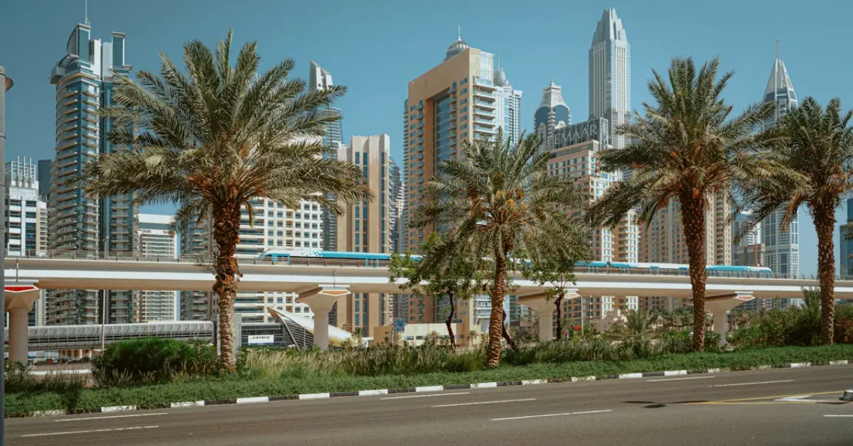 Dubai Metro behind Palm Trees