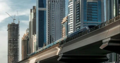 Dubai metro set against the modern skyscrapers