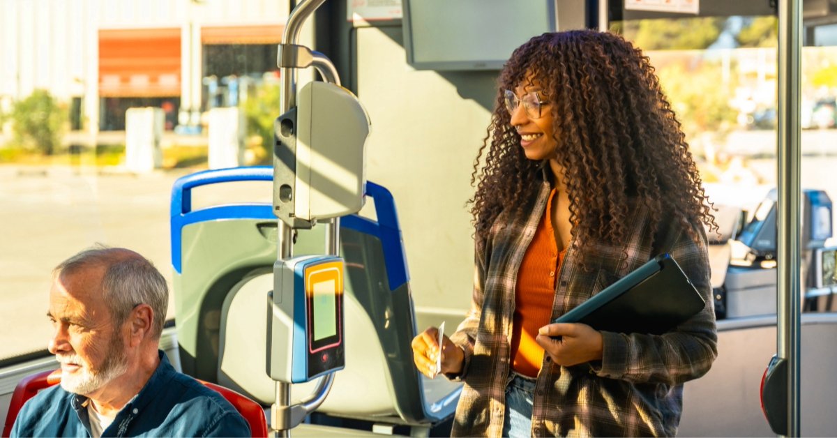 Woman paying for bus fare