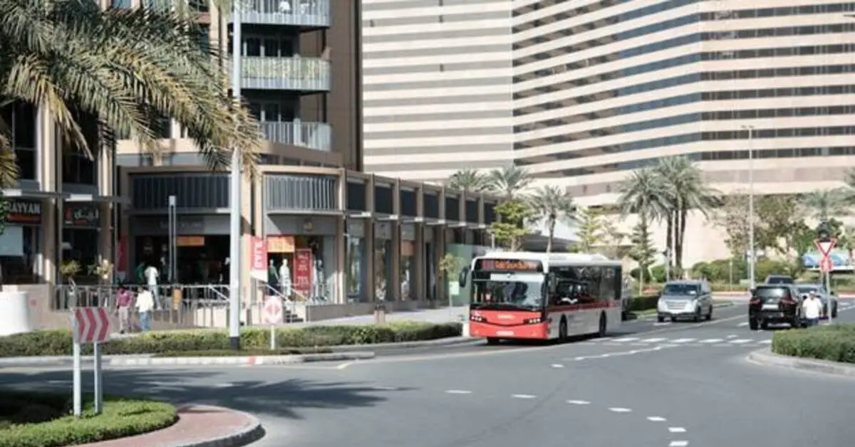 X28 bus operating on a main road in Dubai