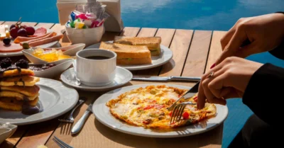 A woman enjoying her breakfast with a view